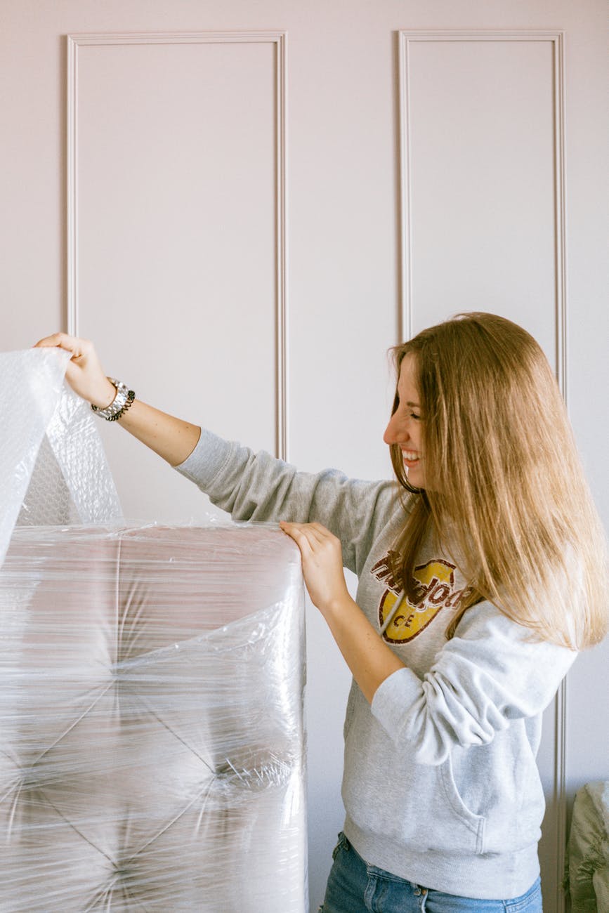 girl unpacking furniture