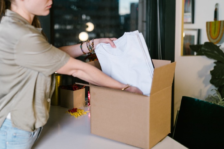 packing items away in boxes